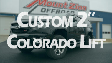 custom 2" colorado lift youtube thumbnail with black chevy colorado at mount zion offroad