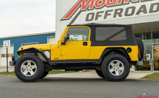 2006 Jeep Wrangler Unlimited in Solar Yellow with Metalcloak armor and flares