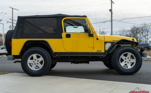 2006 Jeep Wrangler Unlimited in Solar Yellow side shot