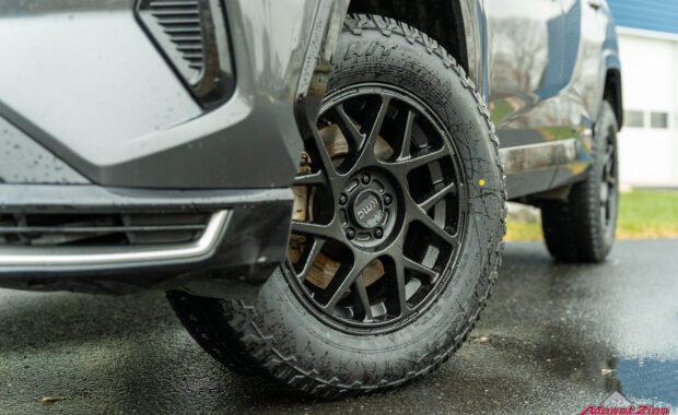 2021 Toyota Rav4 Gray, Eibach Pro Lift, black KMC wheels, driver front and rear wheel detail
