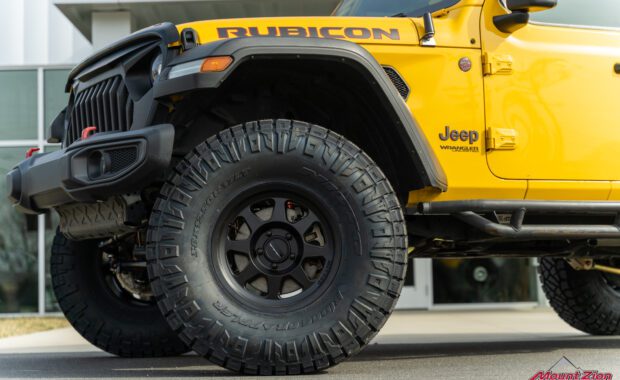 Lifted Jeep Rubicon front method wheel and Nitto tire detail