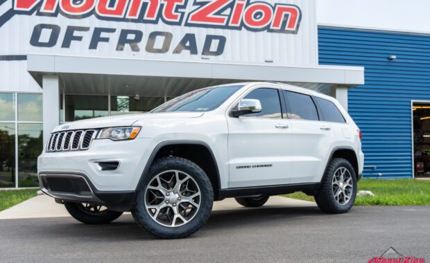 white Jeep grand cherokee with Nitto Recon grappler A/T by mount zion offroad