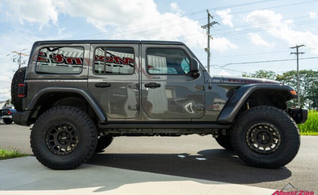 2022 Jeep Wrangler Unlimited Rubicon in Granite Crystal with Method 305 and Nitto Ridge Grappler 37x12.50R17 side shot