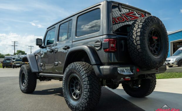 2022 Jeep Wrangler Unlimited Rubicon in Granite Crystal with Method 305 and Nitto Ridge Grappler 37x12.50R17 rear driver side