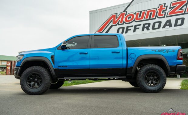 Blue Ram 1500 TRX driver side view at mount zion offroad