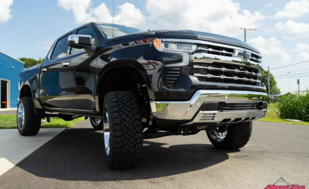 2022 Chevrolet Silverado 1500 with TIS 547C 22x12 6x5.5 -44mm Offset and Nitto Ridge Grappler 35x12.50R22 front passenger side