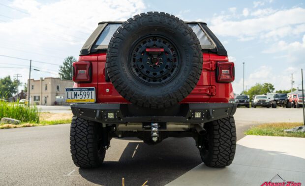 Red 2018 Jeep Wrangler Unlimited Sahara rear end