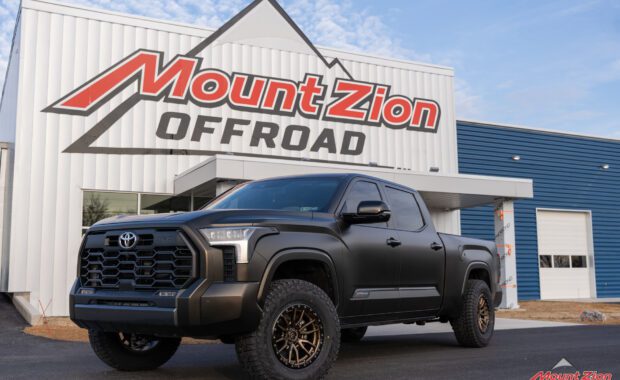 2022 Toyota Tundra 1794 Edition in Satin Black Gold Dust with rough country leveling kit, bronze Fuel Rebel Wheels and Falken Wildpeak Tires at mount zion offroad