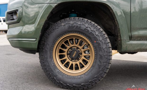 2022 toyota 4runner with bronze kmc wheels and falken wildpeak tires front driver side tire