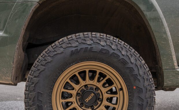 2022 toyota 4runner with bronze kmc wheels and falken wildpeak tires rear passenger side wheel well