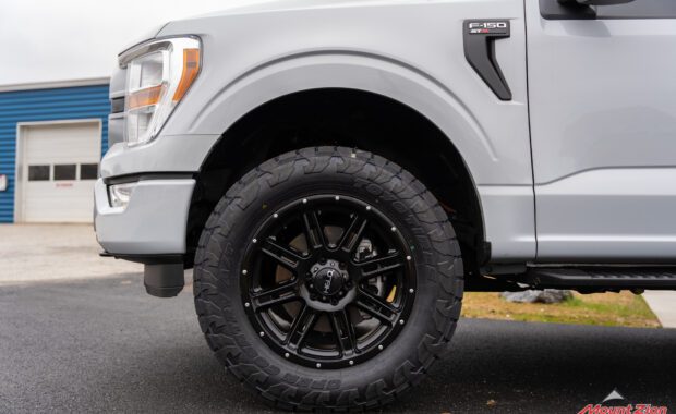 Toyo tires open country A/T on white Ford F150