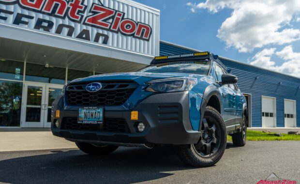 2022 Subaru Outback Wilderness blue, driver front corner low shot