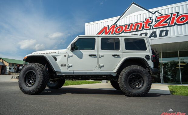 white 2022 jeep wrangler at mount zion offroad side view in front of mount zion offroad side