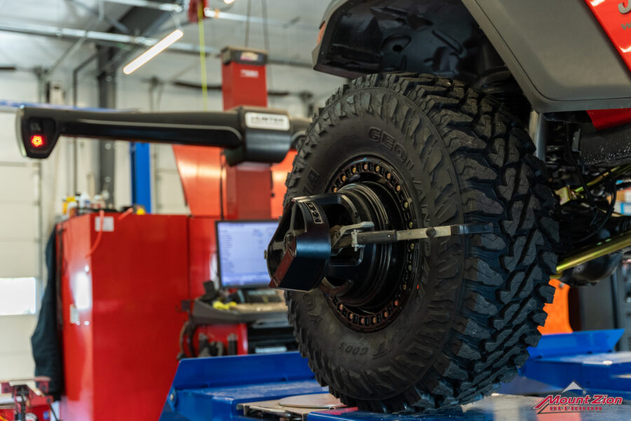 4x4 alignment machine from Hunter Engineering with red jeep