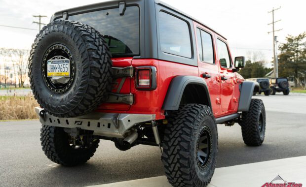 rear end passenger side of 2021 Jeep Wrangler Unlimited Rubicon Flame Red