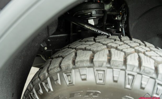 Readylift UCA and Rancho suspension on 2022 gmc sierra 1500 AT4 closeup above tire