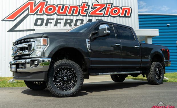 2020 ford F250 Superduty lifted Fox suspension with TIS wheels and Nitto Tires built by Mount Zion Offroad driver side