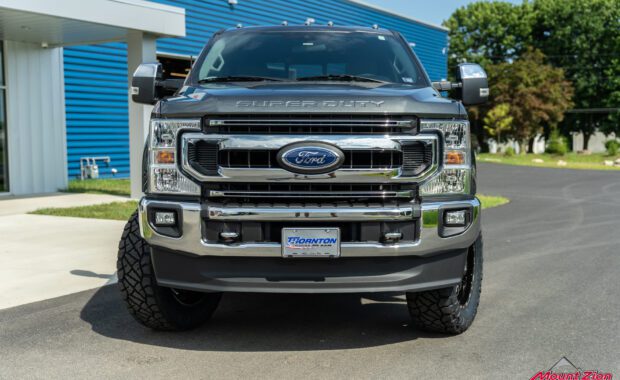2020 ford F250 Superduty lifted Fox suspension with TIS wheels and Nitto Tires built by Mount Zion Offroad grille