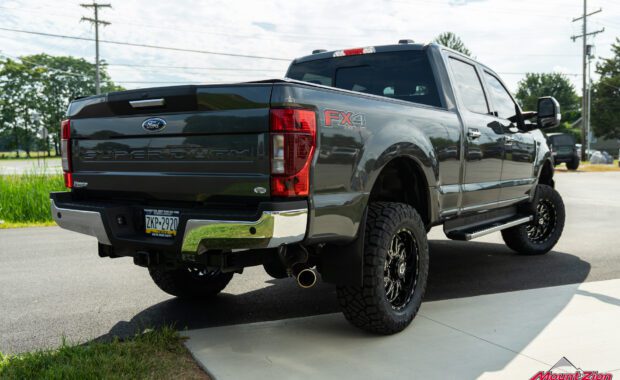2020 ford F250 Superduty lifted Fox suspension with TIS wheels and Nitto Tires built by Mount Zion Offroad rear passenger side