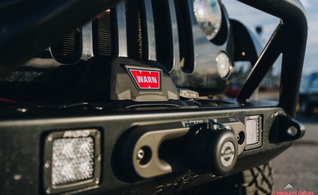 Warn Winch and rigid cube lighting in front offroad bumper