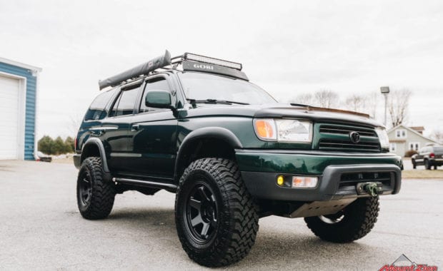 Green 4runner front grille with winch and roof rack front passenger side grille view