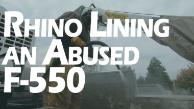 Rhino lining an abused F-550 YouTube thumbnail featuring working hosing down truck bed