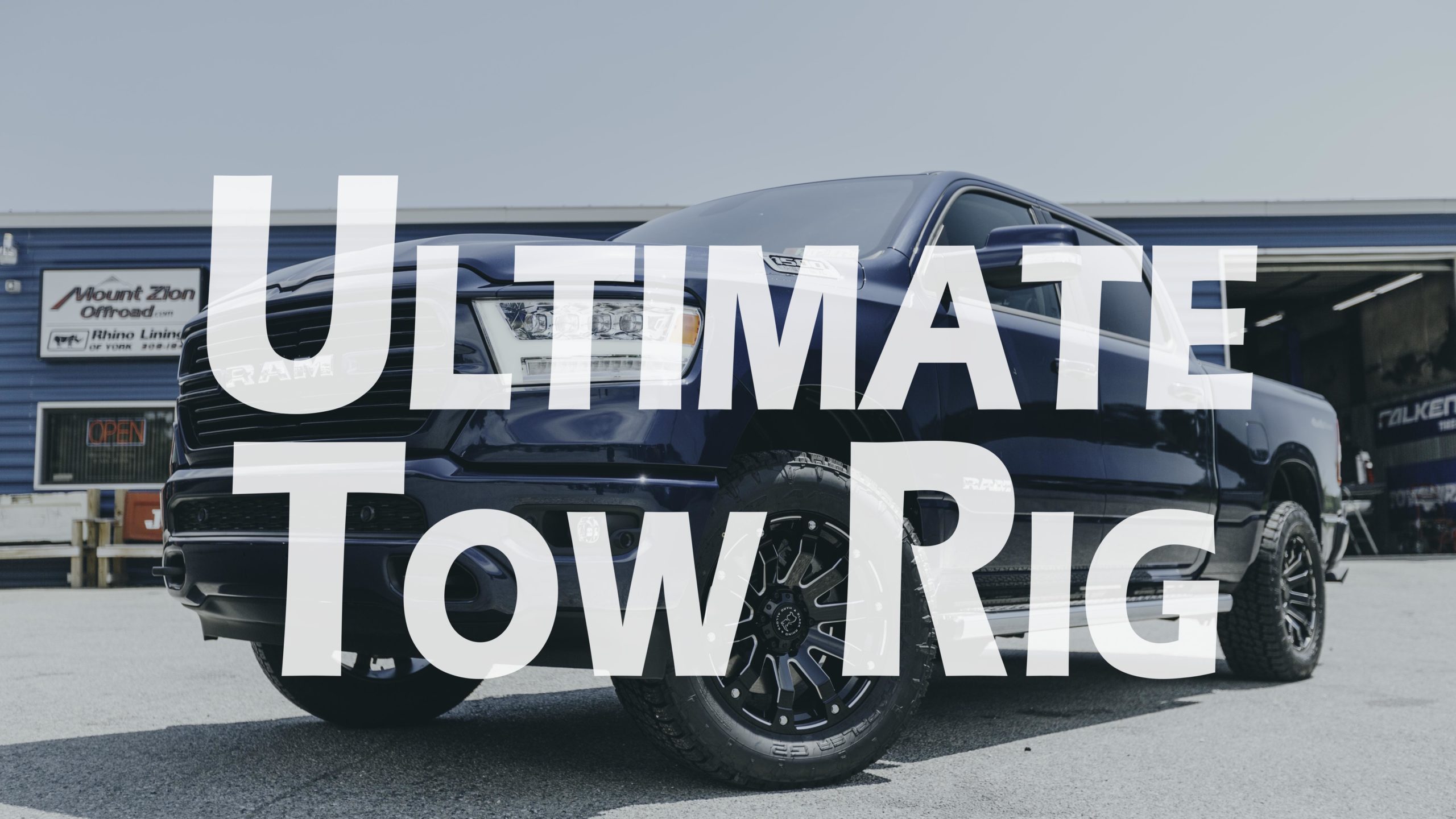 Ultimate Tow Rig Youtube thumbnail featuring Blue Ram leveled with black wheels at mount zion offroad