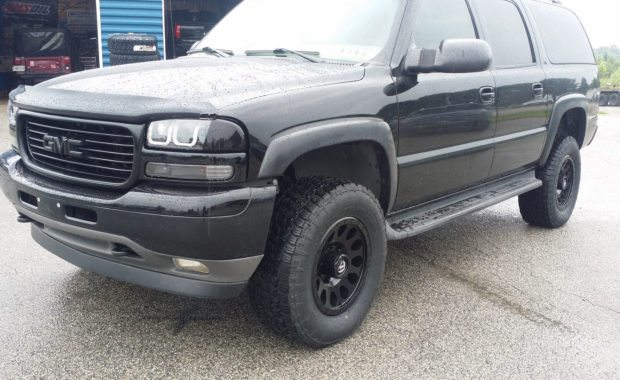 Black GMC with Fuel Wheels and upgraded headlights