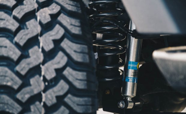 close up on bilstein shock and tire tread