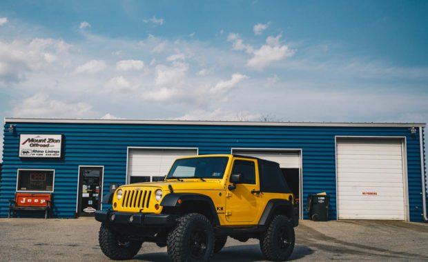 Two door yellow jeep wranlger with bilstein AEV suspension and fuel wheels at Mount Zion offroad