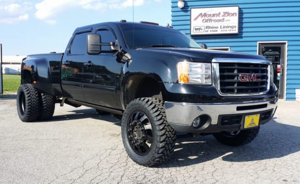 Lifted GMC dually with upgrades wheels & tires