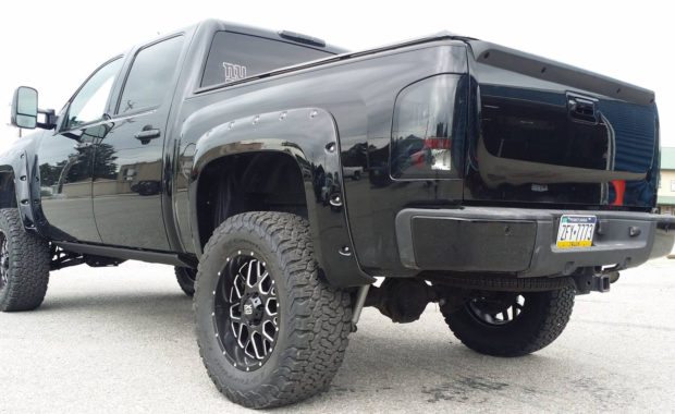 Lifted Chevy with XD wheels rear driver side
