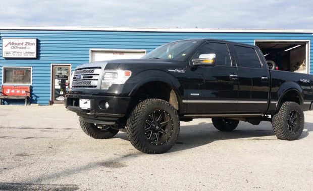 Black Ford f150 lifted with Fuel wheels