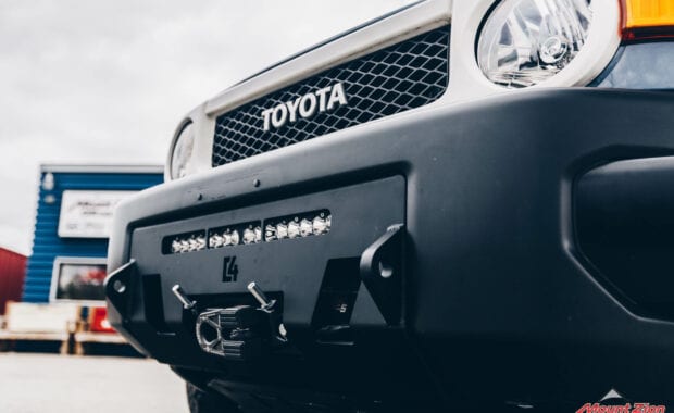 Toyota FJ grille with front bumper winch and light bar