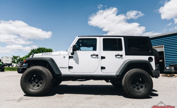 White 2015 Jeep Wrangler on Pro Comp Wheel with Pro Comp Tire driver side view