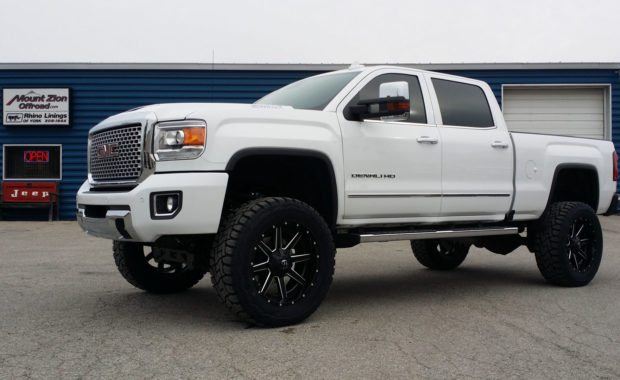 While GMC Denali HD lifted with Fuel Wheels