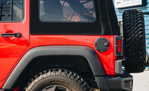 Red 2017 Jeep rubicon offroad build rear driver side view