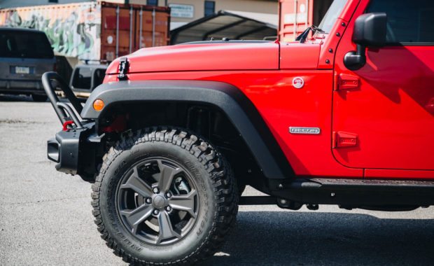 Red 2017 Jeep rubicon offroad build front driver side wheel