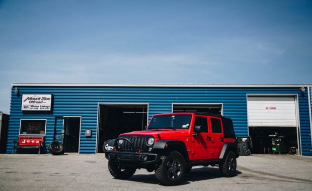 red jeep wrangler with offroad front bumper
