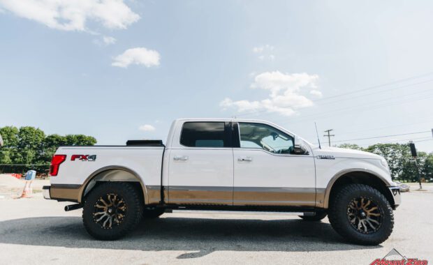 Leveled F150 with 18x9 +20 Fuel Blitz DDT wheels and Nitto Ridge Grappler LT285/70R18 tires passenger side view
