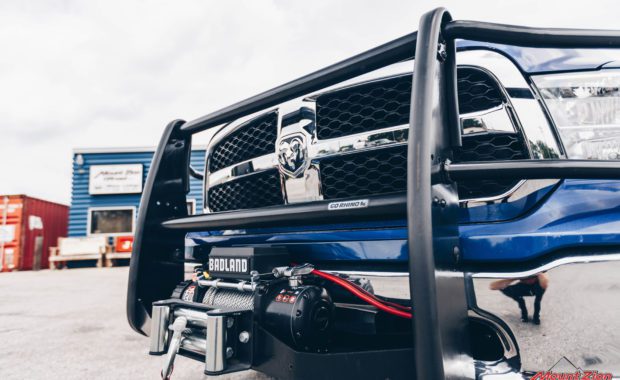 Blue 19 Dodge Ram 1500 with brush bar and winch