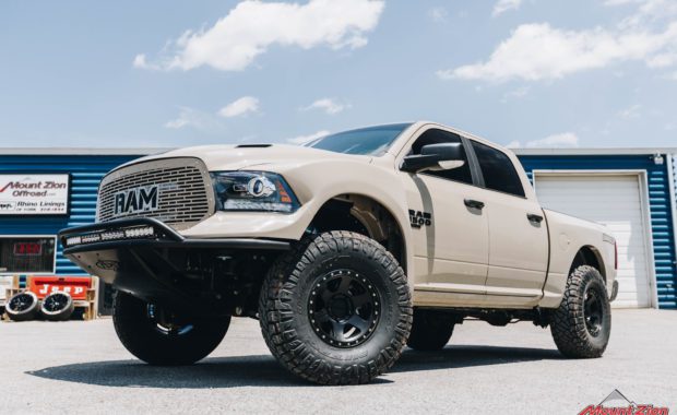 19 Dodge Ram 1500 King Coilovers with ADD front bumper on Method 310 Can 6 Wheels and Nitto Ridge Grappler 37x12.50R17 Tires front driver side grille view