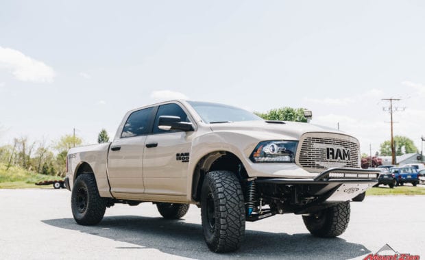 19 Dodge Ram 1500 King Coilovers with ADD front bumper on Method 310 Can 6 Wheels and Nitto Ridge Grappler 37x12.50R17 Tires front passenger side grille view