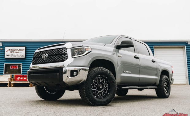 Grey 2019 Tundra on KMC XD 820 18x9 +18mm Wheel and LT305/65R18/10 124/121R FAL WILDPEAK A/T3W RBL Tire front driver side grille view