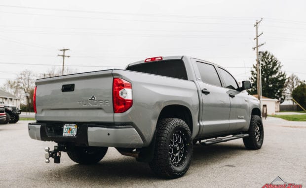 Grey 2019 Tundra on KMC XD 820 18x9 +18mm Wheel and LT305/65R18/10 124/121R FAL WILDPEAK A/T3W RBL Tire rear passenger side tailgate view