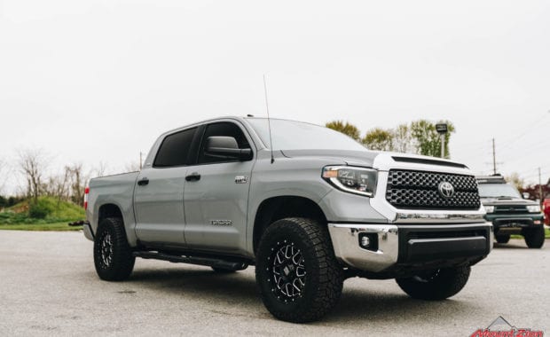 Grey 2019 Tundra on KMC XD 820 18x9 +18mm Wheel and LT305/65R18/10 124/121R FAL WILDPEAK A/T3W RBL Tire front passenger side grille view