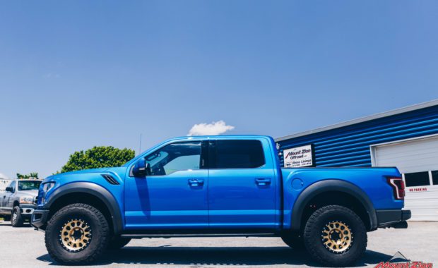 Blue 2020 Ford Raptor with Gold Method 315 17x8.5 +0 mm Wheels driver side view