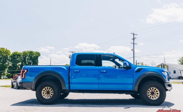 Blue 2020 Ford Raptor with Gold Method 315 17x8.5 +0 mm Wheels passenger side view