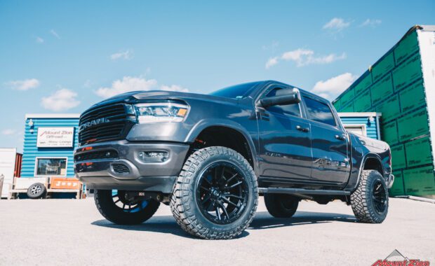 2020 RAM 1500 on 22x10 Fuel Rebel and 37x12.50R22 Nitto Ridge Grapplers front driver side grille view