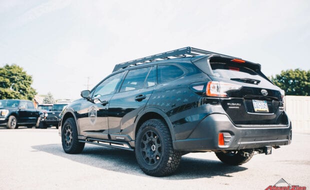 2021 Subaru Outback Touring XT with FLATOUT SUSPENSION on Method 502 Rally Matte Black 17x8 and 245/65R17XL 111T FAL WILDPEAK A/T3W RBL driver side tailgate view
